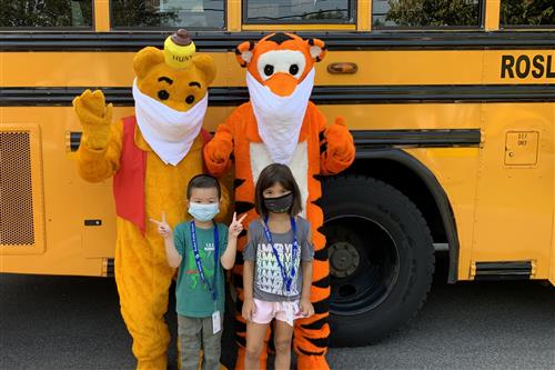 Pooh, Tigger, and students 